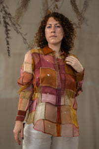 Woman wearing HeenaAgrima's Warm Indradhanush Silk Organza Shirt, a patchwork shirt with a neutral background