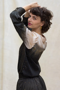 Woman wearing HenaAgrima's Papilio Satin Silk Shirt, a black and gray gradient outfit against a neutral background