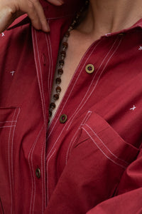 Closeup of red organic cotton shirt, named cherry, made by HeenaAgrima