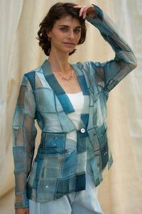 Woman wearing HeenaAgrima's Blu Dream Jacket, a blue patchwork organza jacket against a neutral background. 
