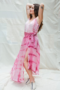 Woman wearing HeenaAgrima's Gulabi Silk Organza Skirt, a pink tie-dye dress against a white background. 