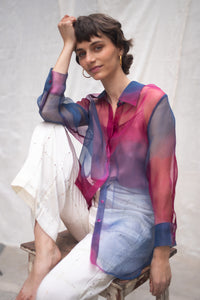 Woman wearing HeenaAgrima's Oasis 2.0 Silk Organza Shirt, a colorful, sheer shirt, naturally dyed sappanwood and indigo. 